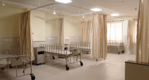 beds in the ward with no mattresses yet