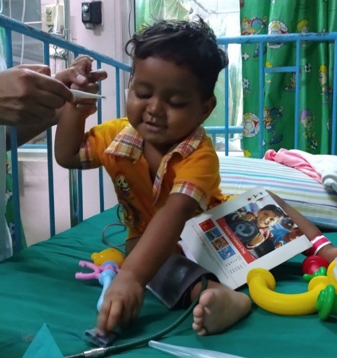 Vishal came to CMC hospital  for his cancer treatment - seen here happy, in the ward cot, before any treatment starts